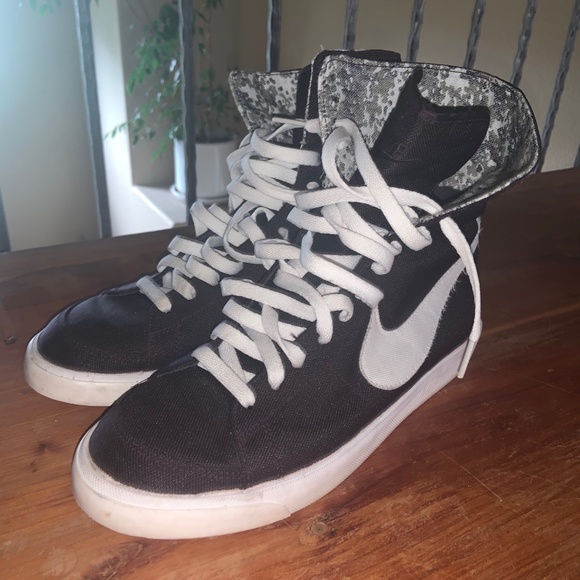 black and purple high top nikes